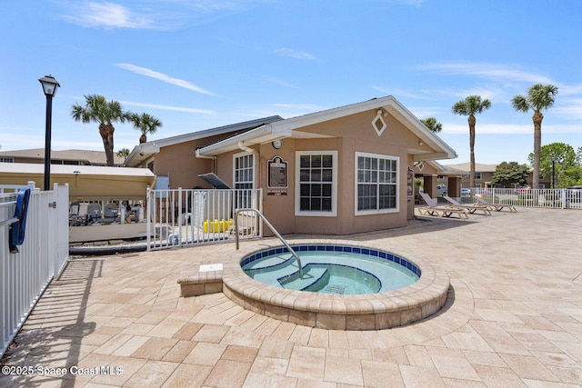 1880 Long Iron Dr Unit 1322, Rockledge, FL 32955 - view of swimming pool featuring a community hot tub and a patio area