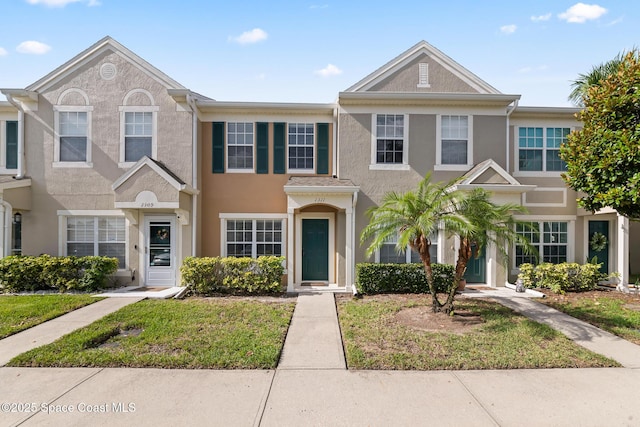 1311 Hampton Park Ln, Melbourne, FL 32940 - view of property with stucco siding