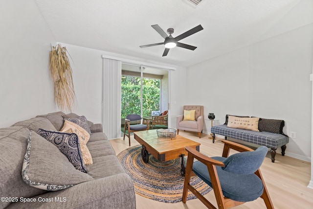 1311 Hampton Park Ln, Melbourne, FL 32940 - living room featuring ceiling fan and light wood-type flooring