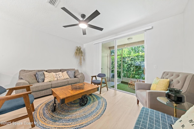 1311 Hampton Park Ln, Melbourne, FL 32940 - living room featuring wood finished floors and a ceiling fan