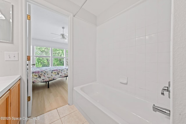 1311 Hampton Park Ln, Melbourne, FL 32940 - ensuite bathroom featuring vanity, a ceiling fan, and tile patterned flooring