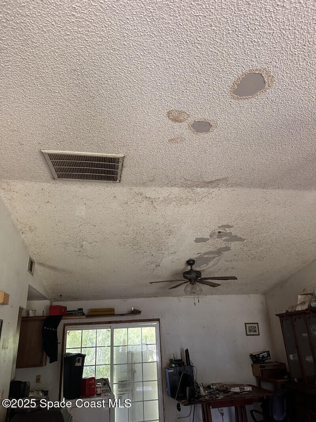 4840 Mango Ave, Cocoa, FL 32926 - detailed view of a textured ceiling and ceiling fan