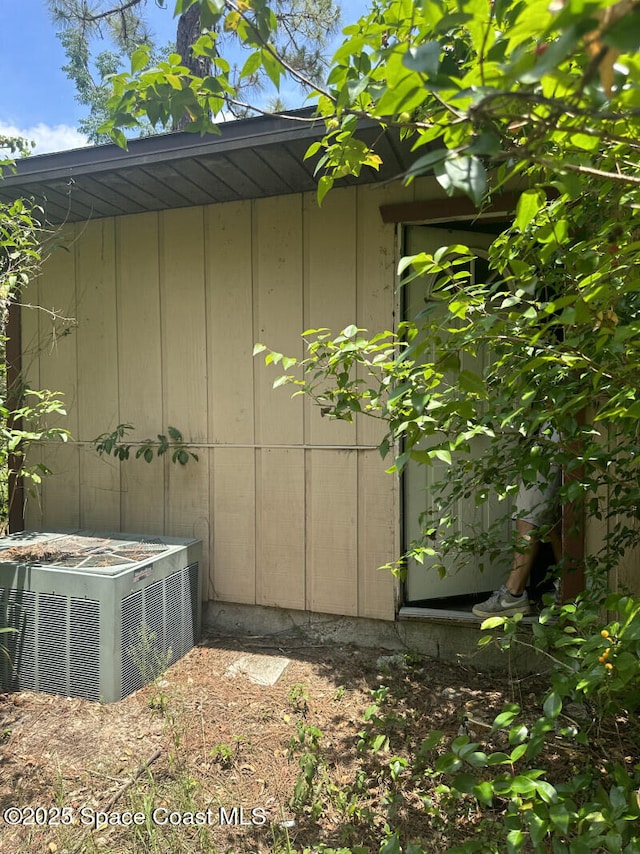 4840 Mango Ave, Cocoa, FL 32926 - view of home's exterior featuring a cooling unit