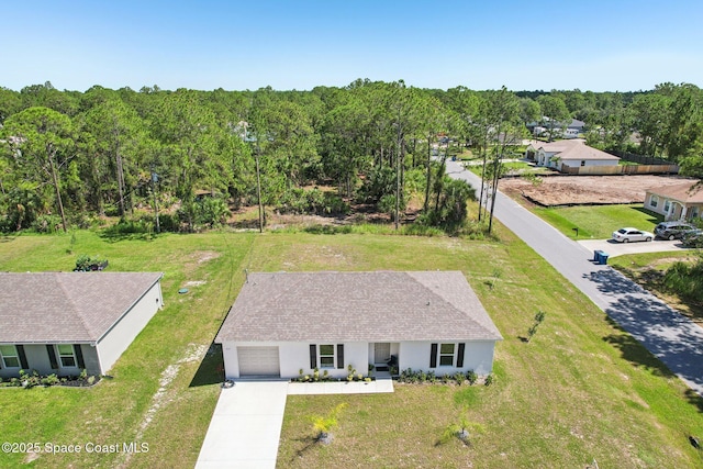 417 Reading St SE, Palm Bay, FL 32909 - view from above of property featuring a forest