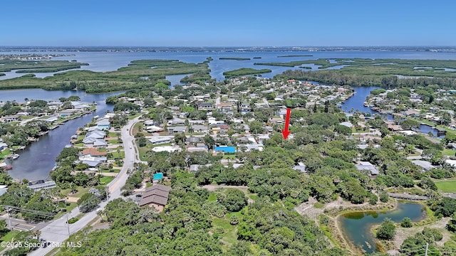 955 Samar Rd, Cocoa Beach, FL 32931 - aerial view of property and surrounding area with a nearby body of water and nearby suburban area