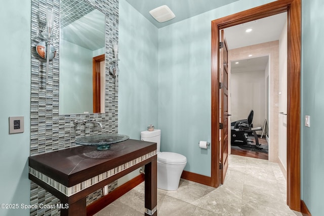 2375 S Atlantic Ave Unit 601, Cocoa Beach, FL 32931 - half bath featuring vanity and tasteful backsplash