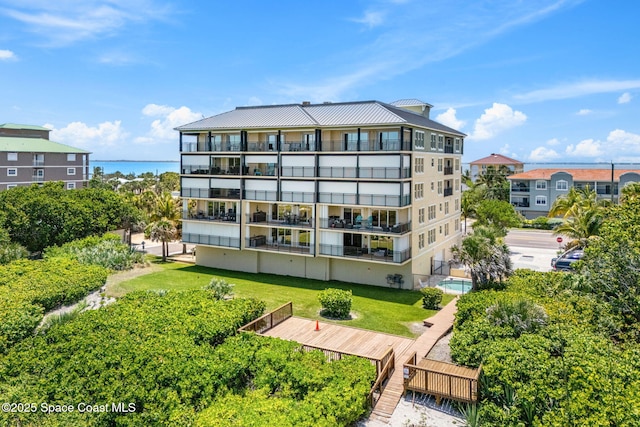 2375 S Atlantic Ave Unit 601, Cocoa Beach, FL 32931 - view of building exterior with a water view