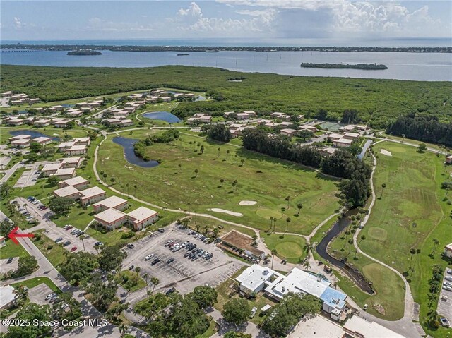 57 Woodland Dr Unit 201, Vero Beach, FL 32962 - aerial view of property's location with a large body of water and nearby suburban area