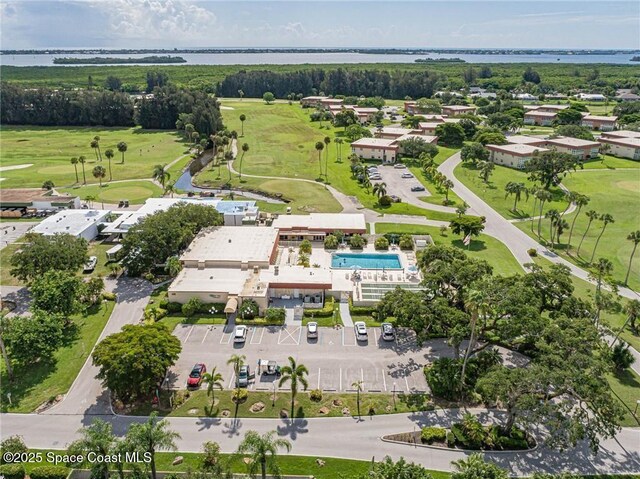 57 Woodland Dr Unit 201, Vero Beach, FL 32962 - aerial view of property and surrounding area with a nearby body of water and a local golf course
