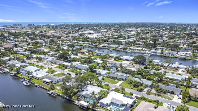 432 N Neptune Dr, Satellite Beach, FL 32937 - aerial perspective of suburban area featuring a nearby body of water