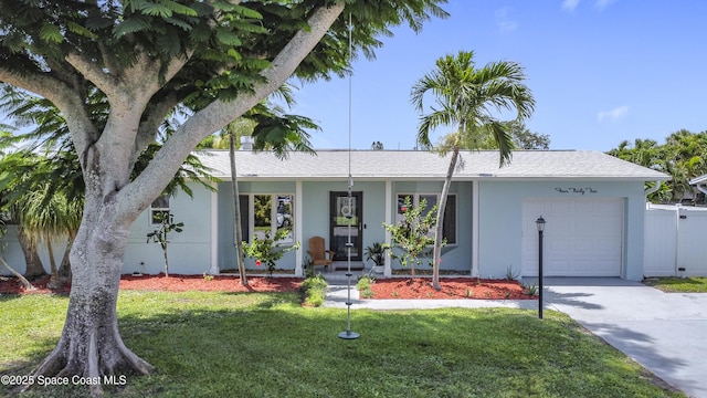 432 N Neptune Dr, Satellite Beach, FL 32937 - ranch-style home featuring an attached garage, stucco siding, and concrete driveway