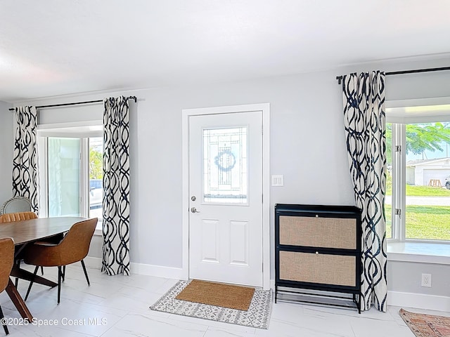 432 N Neptune Dr, Satellite Beach, FL 32937 - entrance foyer featuring baseboards