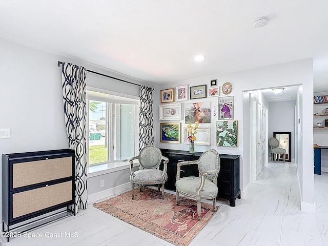 432 N Neptune Dr, Satellite Beach, FL 32937 - living area featuring marble finish flooring and recessed lighting