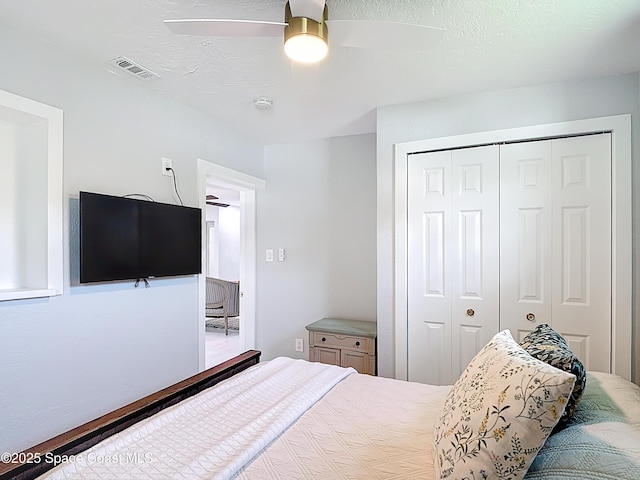 432 N Neptune Dr, Satellite Beach, FL 32937 - bedroom featuring a closet and a ceiling fan