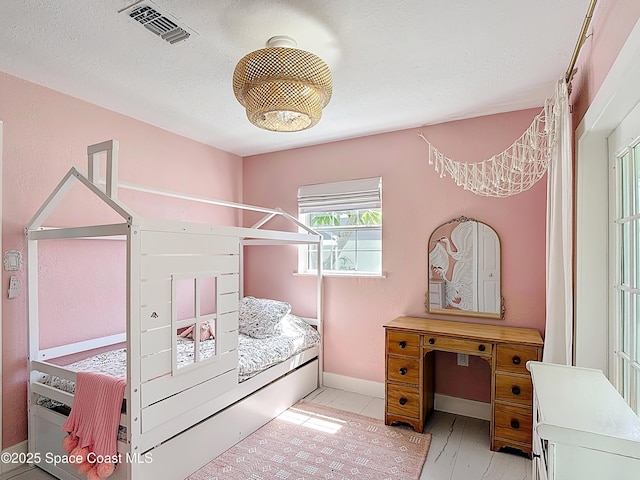 432 N Neptune Dr, Satellite Beach, FL 32937 - bedroom featuring baseboards