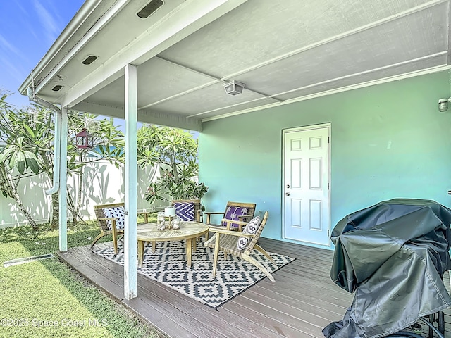 432 N Neptune Dr, Satellite Beach, FL 32937 - wooden terrace with grilling area