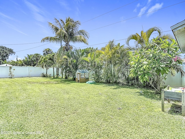 432 N Neptune Dr, Satellite Beach, FL 32937 - fenced backyard with a shed