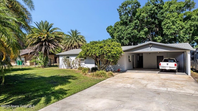 13 Lee St, Cocoa, FL 32926 - ranch-style home featuring a front lawn, driveway, and a carport
