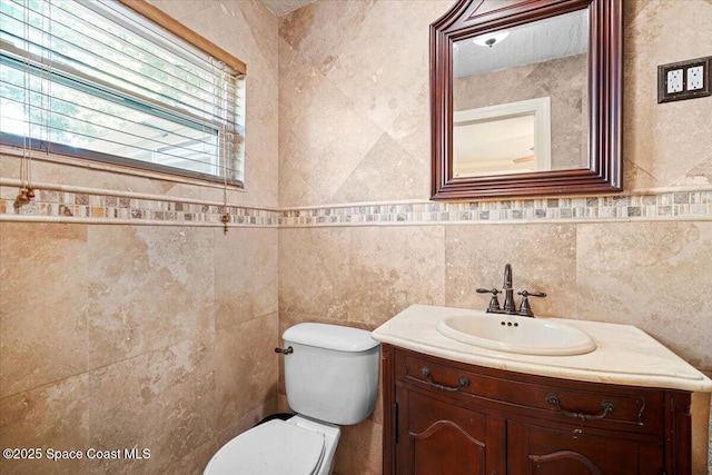 13 Lee St, Cocoa, FL 32926 - half bathroom featuring tile walls and vanity