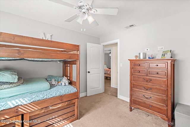 13 Lee St, Cocoa, FL 32926 - bedroom with light carpet and ceiling fan