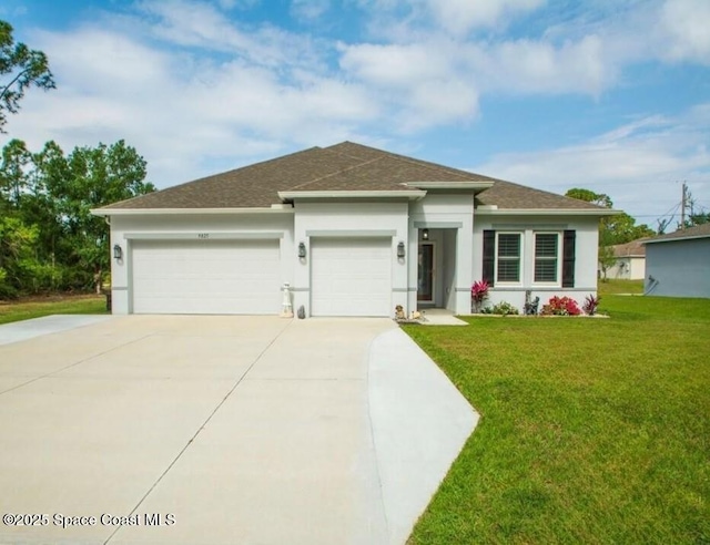 9025 106th Ave, Vero Beach, FL 32967 - view of front of home featuring a garage, stucco siding, roof with shingles, concrete driveway, and a front lawn