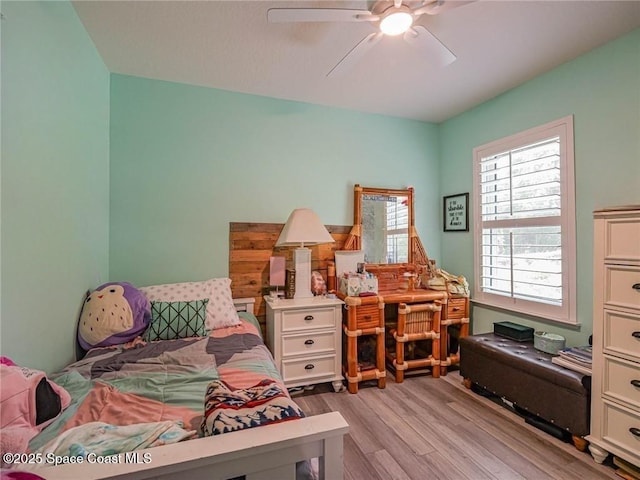 9025 106th Ave, Vero Beach, FL 32967 - bedroom featuring light wood-style floors and a ceiling fan