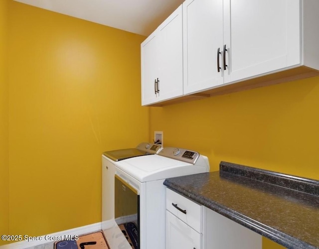 9025 106th Ave, Vero Beach, FL 32967 - laundry area with cabinet space and washer and dryer