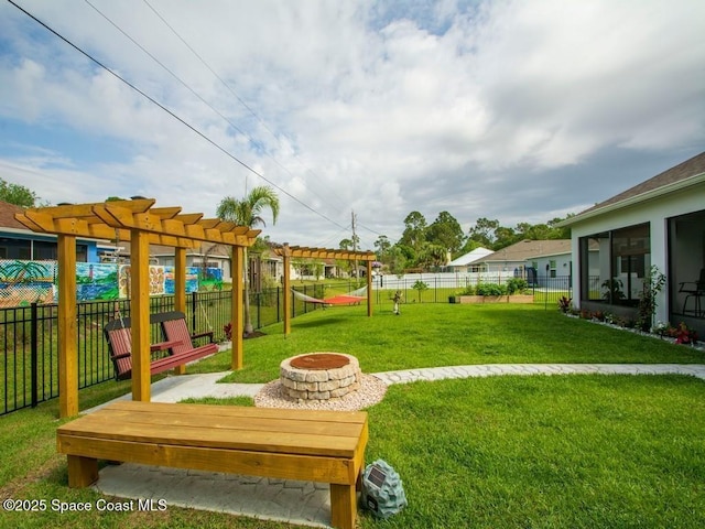 9025 106th Ave, Vero Beach, FL 32967 - fenced backyard with a pergola and an outdoor fire pit