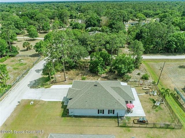 9025 106th Ave, Vero Beach, FL 32967 - aerial view of property and surrounding area featuring a forest
