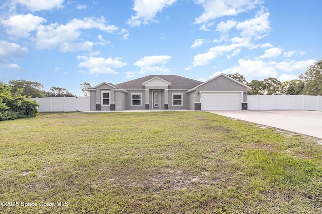 3735 Crista Jean Ave, Grant-Valkaria, FL 32909 - ranch-style house featuring stucco siding, a garage, and concrete driveway