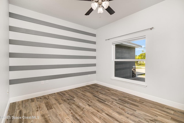 3735 Crista Jean Ave, Grant-Valkaria, FL 32909 - unfurnished room featuring wood finished floors and a ceiling fan