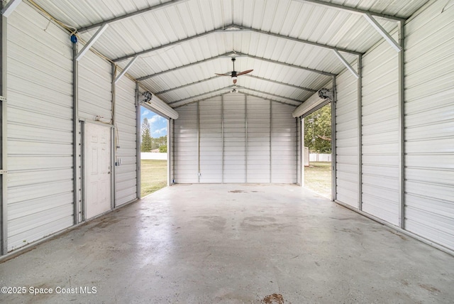 3735 Crista Jean Ave, Grant-Valkaria, FL 32909 - garage with metal wall and a ceiling fan