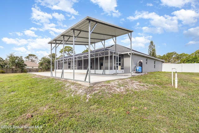 3735 Crista Jean Ave, Grant-Valkaria, FL 32909 - rear view of property featuring a patio area, a fenced backyard, a lanai, and stucco siding