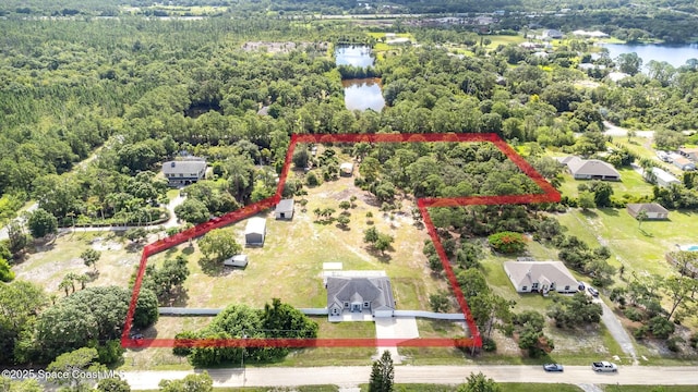 3735 Crista Jean Ave, Grant-Valkaria, FL 32909 - aerial view of property's location featuring a nearby body of water and property boundaries highlighted