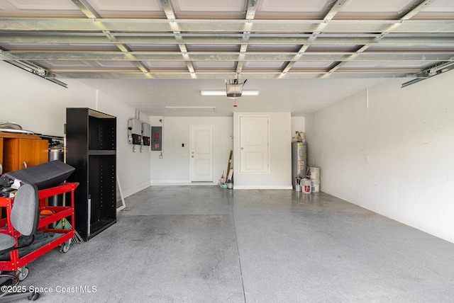 3735 Crista Jean Ave, Grant-Valkaria, FL 32909 - garage featuring electric panel, a garage door opener, and electric water heater