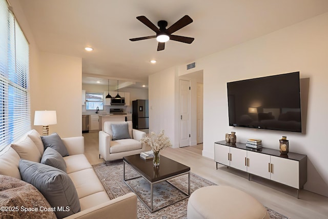 1810 Dixon Blvd, Cocoa, FL 32922 - living room featuring ceiling fan and recessed lighting