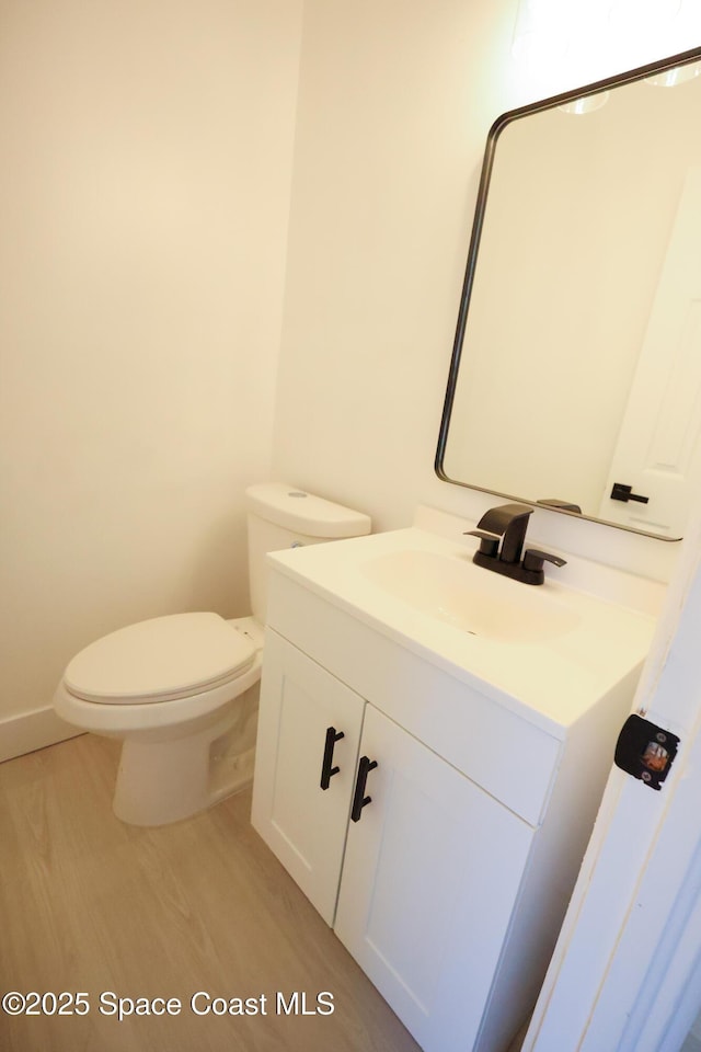 1810 Dixon Blvd, Cocoa, FL 32922 - bathroom with vanity and wood finished floors