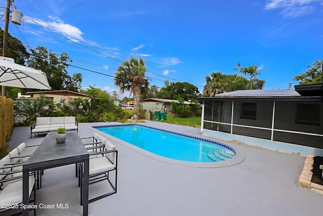 1810 Dixon Blvd, Cocoa, FL 32922 - outdoor pool with a sunroom, a patio, and an outdoor living space