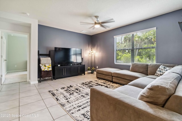1809 Morely Dr, Cocoa, FL 32926 - living room featuring light tile patterned floors and a ceiling fan