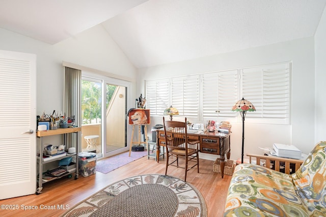 1100 SE Mitchell Ave Unit 204, Port St Lucie, FL 34952 - office area featuring vaulted ceiling and wood finished floors