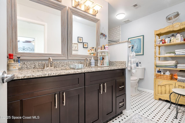 1100 SE Mitchell Ave Unit 204, Port St Lucie, FL 34952 - full bath with double vanity and tile patterned floors