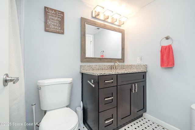 1100 SE Mitchell Ave Unit 204, Port St Lucie, FL 34952 - bathroom featuring toilet and vanity