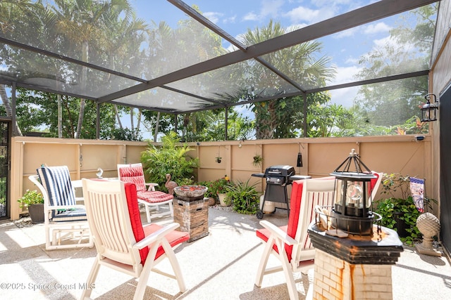 1100 SE Mitchell Ave Unit 204, Port St Lucie, FL 34952 - view of patio / terrace featuring a grill and a lanai