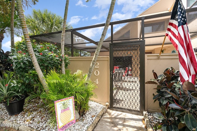1100 SE Mitchell Ave Unit 204, Port St Lucie, FL 34952 - gate featuring a lanai