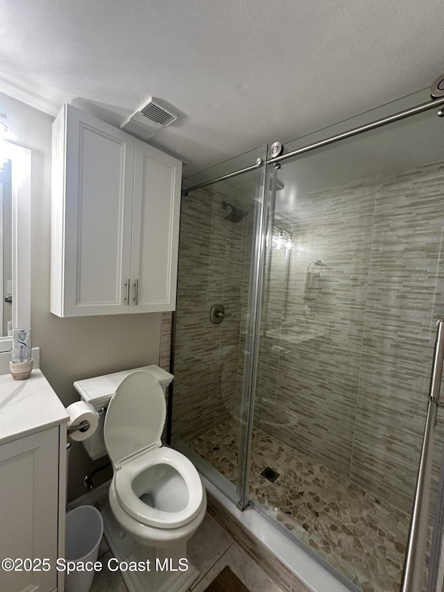 3210 N Harbor City Blvd Unit 316, Melbourne, FL 32935 - full bathroom with vanity, a shower stall, and tile patterned floors