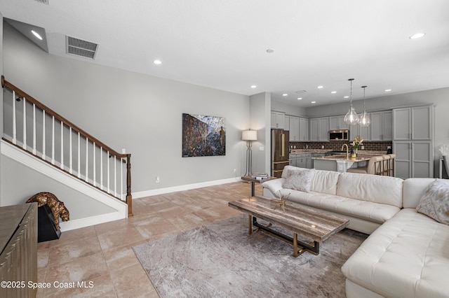 2225 Framura Ln, Melbourne, FL 32940 - living area featuring recessed lighting and stairway