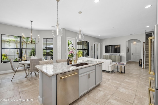 2225 Framura Ln, Melbourne, FL 32940 - kitchen featuring stainless steel dishwasher, recessed lighting, open floor plan, an island with sink, and light tile patterned flooring