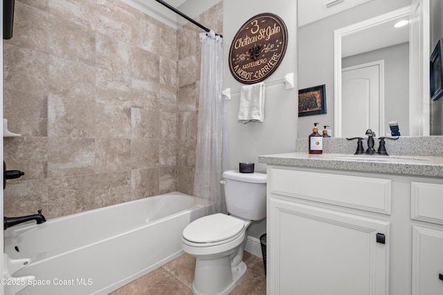 2225 Framura Ln, Melbourne, FL 32940 - full bath featuring vanity, shower / bath combo with shower curtain, and tile patterned flooring