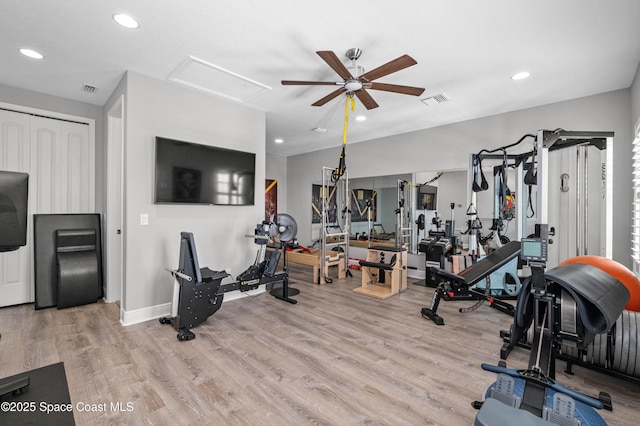 2225 Framura Ln, Melbourne, FL 32940 - gym featuring ceiling fan, wood finished floors, attic access, and recessed lighting