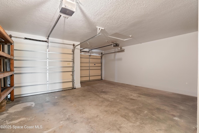 47 Anchor Dr, Indian Harbour Beach, FL 32937 - garage featuring a garage door opener